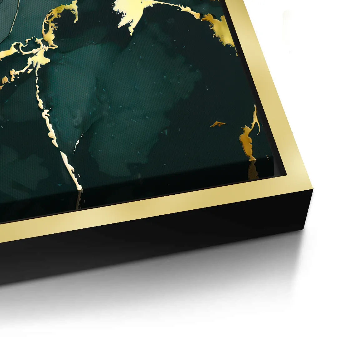 2Close-up of the corner of a dark green and gold abstract canvas in a gold frame, showcasing the border design.
