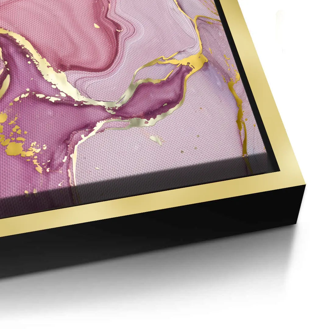 2Close-up corner of canvas print in gold frame with black side, pink, purple, blue, and gold fluid art