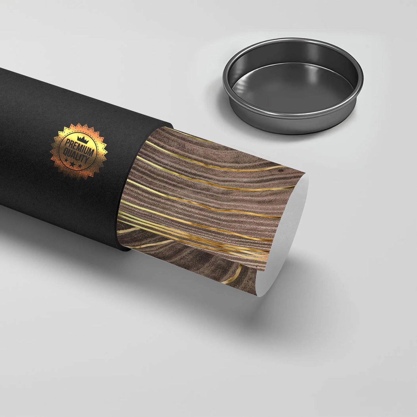 2Rolled abstract wood ring poster with gold lines being taken out of a black 'Premium Quality' tube.