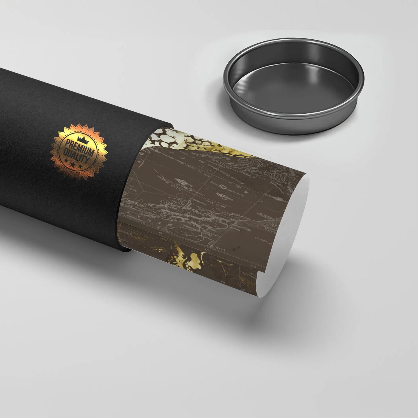 2Rolled gold giraffe poster, poster material, being taken out of a black 'Premium Quality' tube.