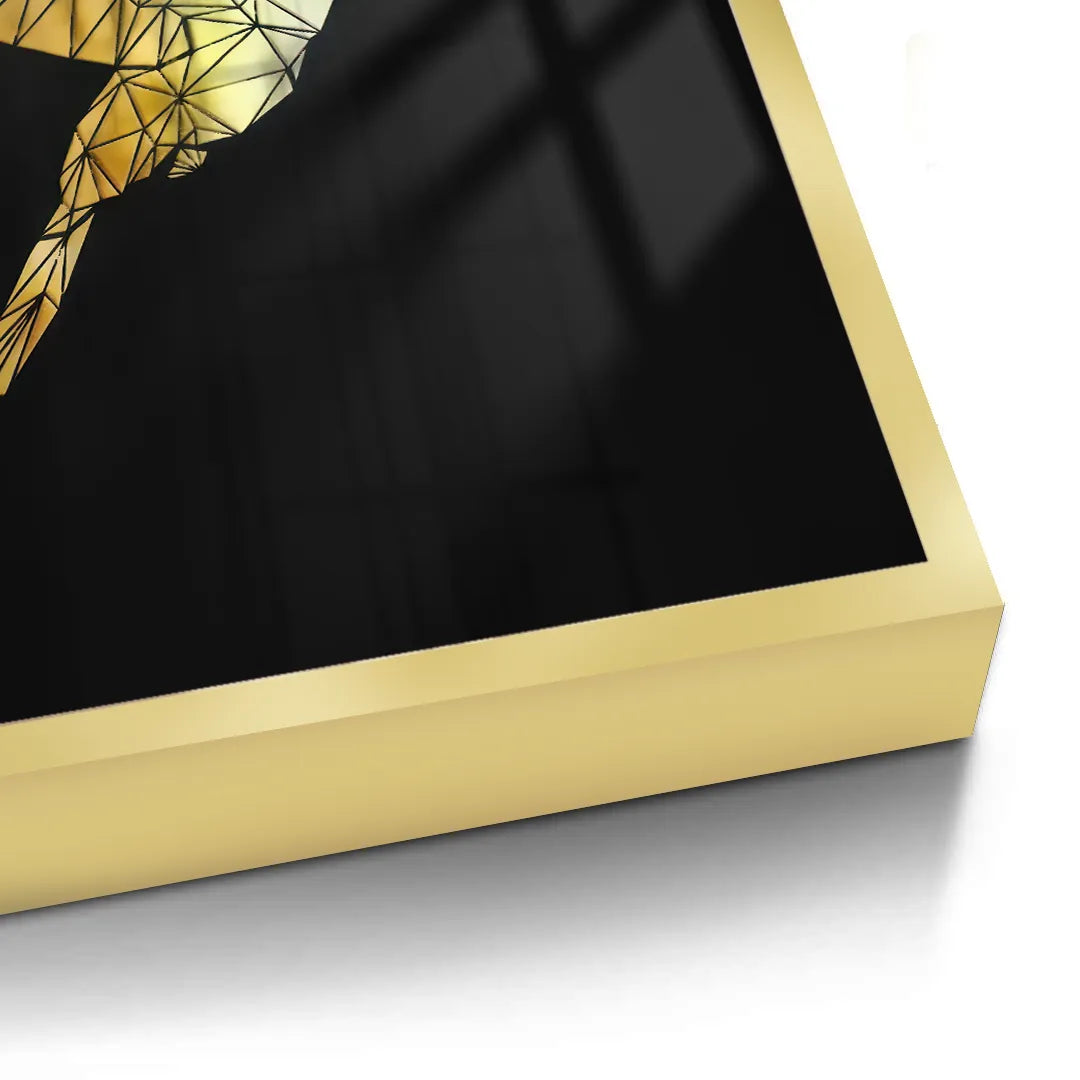 2Close-up of the corner of a gold framed fine art print featuring a golden geometric hummingbird.