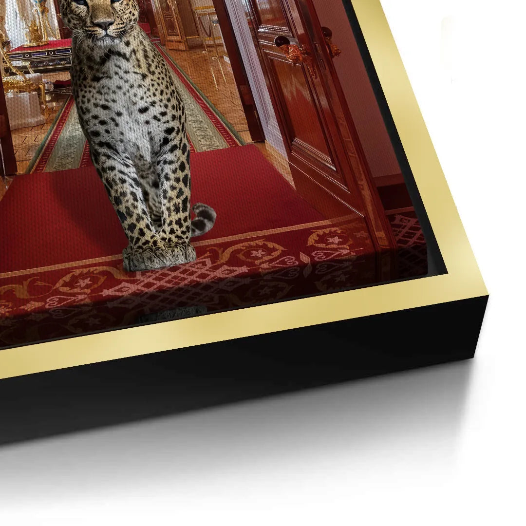 2Close-up of the leopard on the canvas print, showcasing the edge of the gold frame.