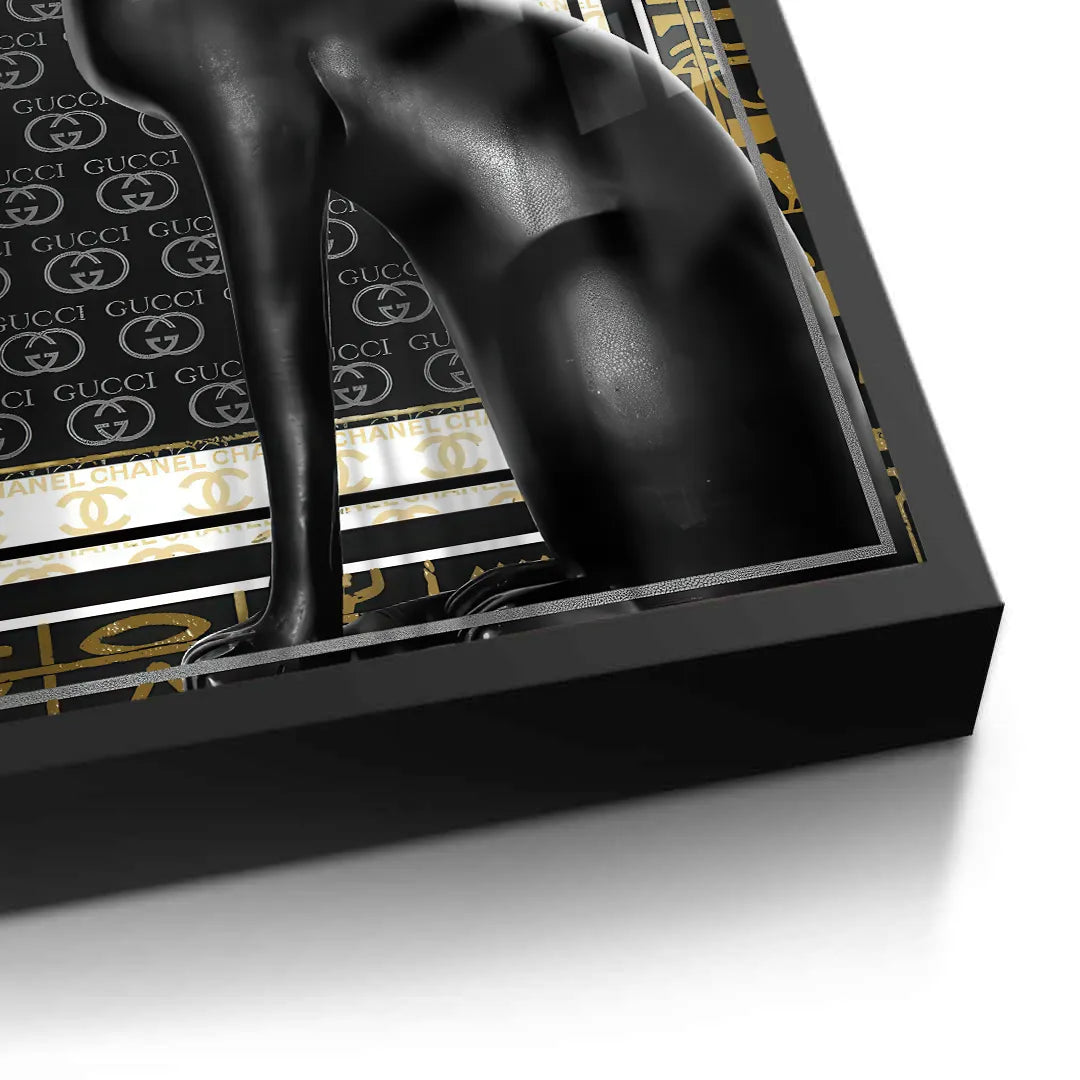 2Close-up of black frame on black and gold fine art print