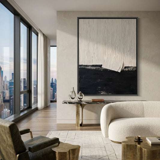 Minimalist 'Black & White Plaster' canvas art featuring raised geometric fragments and a matte stone finish, bringing architectural contrast to a modern Abu Dhabi home