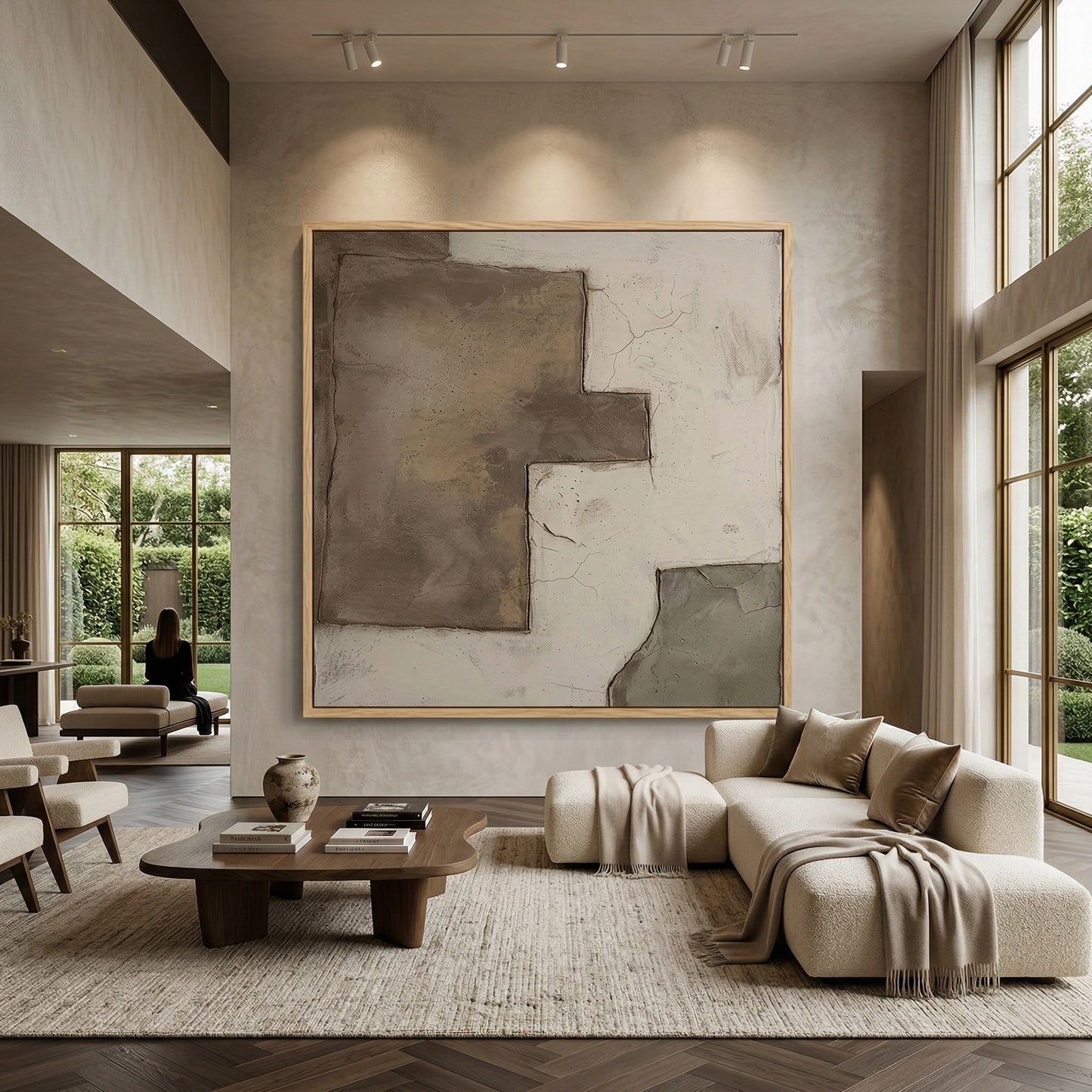 2Minimalist 'Broken Plaster' canvas art with heavy impasto shards and soft shadow play, bringing a grounded 'Wabi-Sabi' aesthetic to a modern Abu Dhabi villa.