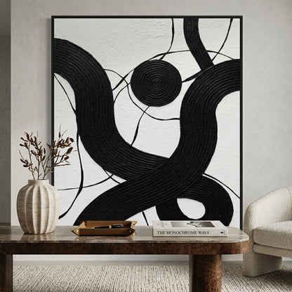 Monochromatic 'Carbon Coil' metallic art with a deep graphite finish, premium wall decor available in the UAE.
