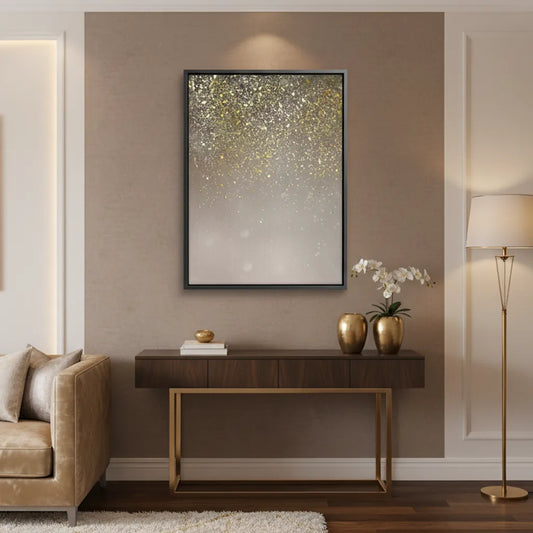 Elegant entryway with a large gold glitter sparkle ombre canvas art in a black frame above a console table UAE Dubai.