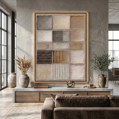 Sculptural 'Earthbound Grid' coffee table with a carved travertine grid pattern and a matte mineral finish, a unique handcrafted furniture piece for high-end UAE interiors.