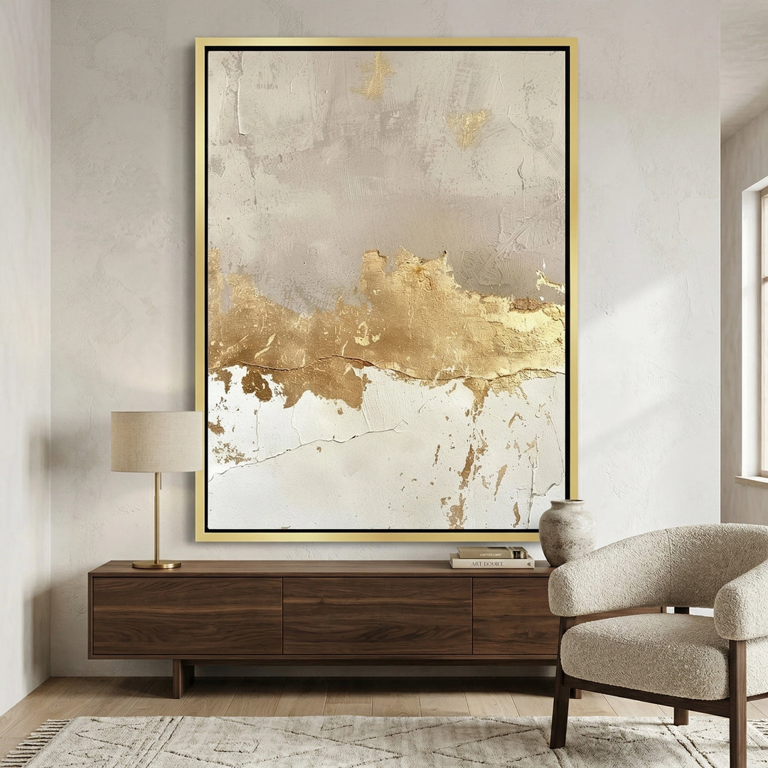 Matte-finish 'Gilded Earth' ceramic vase with a rugged sandstone texture and metallic gold-dipped rim, a chic accessory for a modern Dubai penthouse.