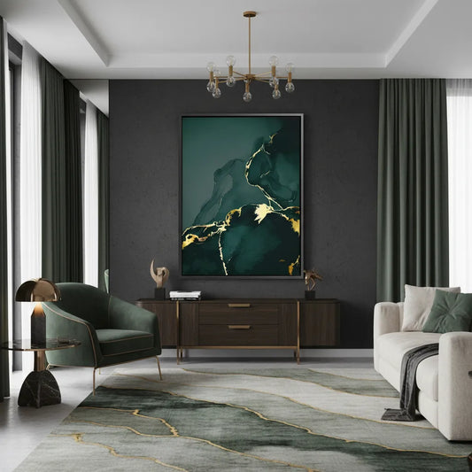 Elegant living room with a large dark green and gold abstract canvas art hanging above a sophisticated console table, green armchairs and matching rug.