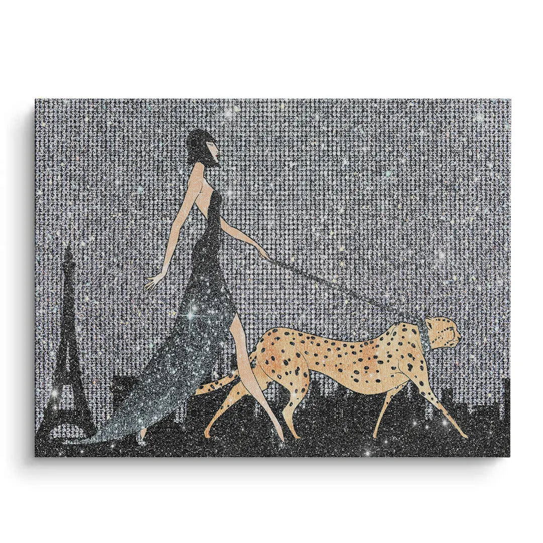 Canvas print of woman walking a cheetah with a silver glitter background and Paris skyline.