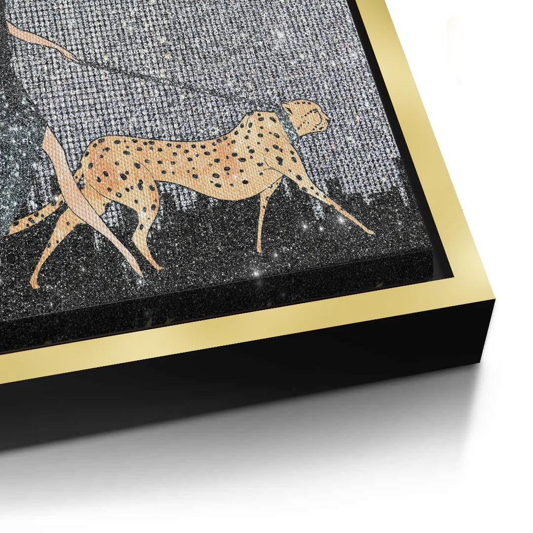 Close-up of the cheetah on the canvas print, showcasing the gold  frame edge.
