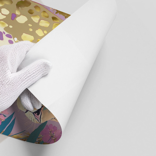 Close-up of a hand in a white glove peeling back the corner of the glam leopard poster art.