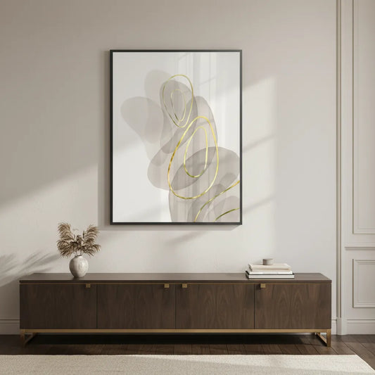 Framed abstract minimal fine art print on wall in modern neutral living room, beige gray and gold line art