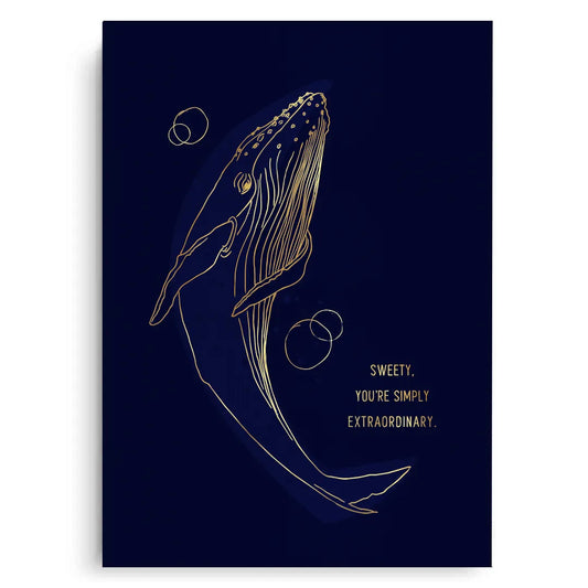 Modern canvas print with gold line art whale on a navy blue background, with the inspirational quote "Sweety, You're Simply Extraordinary."