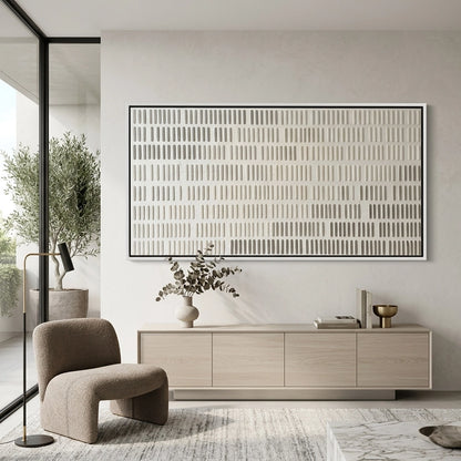 Luxury 'Linear Rhythm' area rug with a high-low pile striped texture in shades of cream and silver, bringing a rhythmic flow to a Dubai lounge.