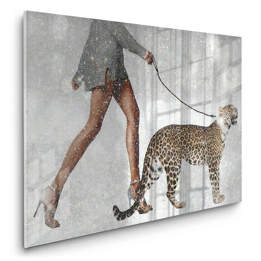Glossy Acrylic print of a woman in high heels walking a leopard on a leash against a sparkling background