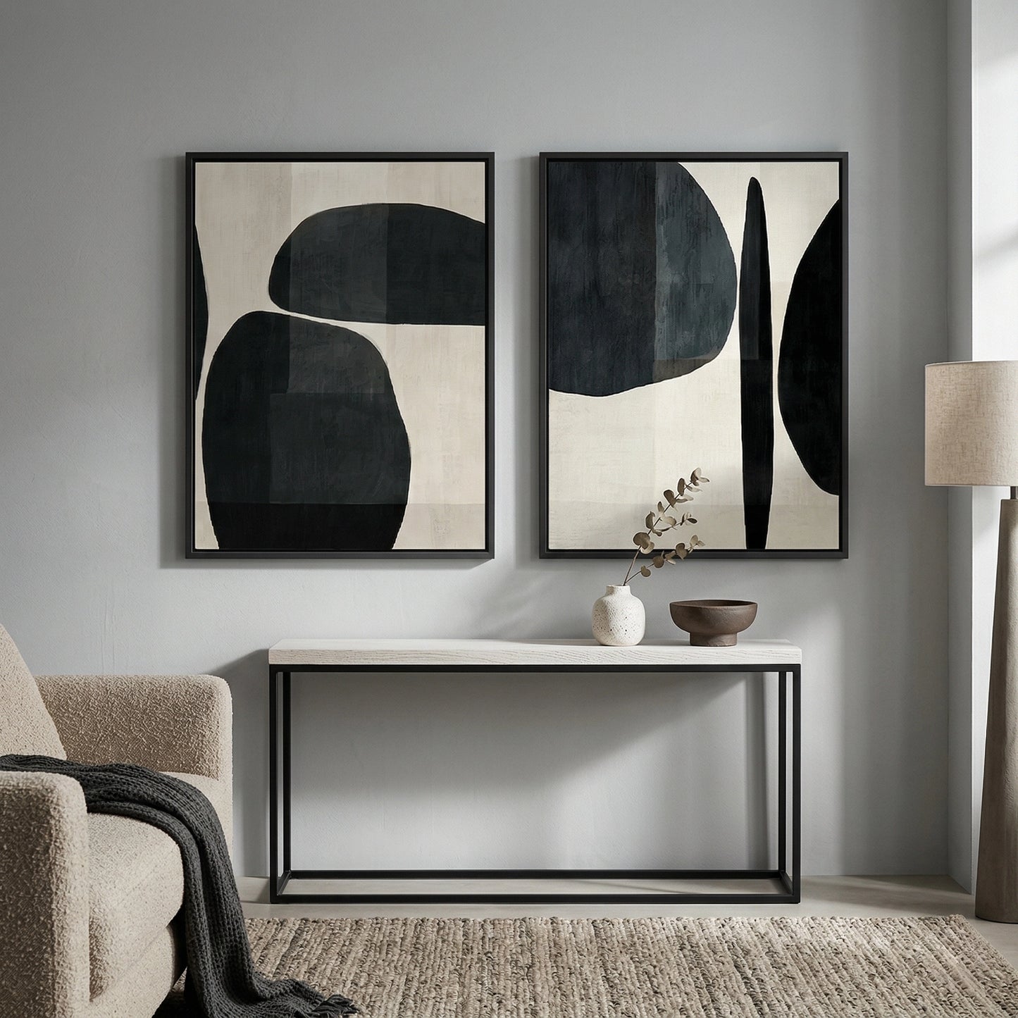 2Abstract 'Monochrome Organic Shapes' set of 2 textured canvases in a high-contrast black and white palette, premium gallery wall decor available in the UAE.