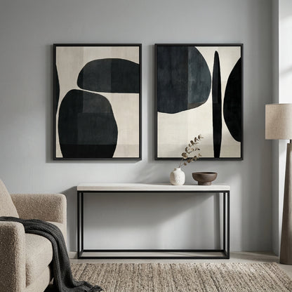 Abstract 'Monochrome Organic Shapes' set of 2 textured canvases in a high-contrast black and white palette, premium gallery wall decor available in the UAE.