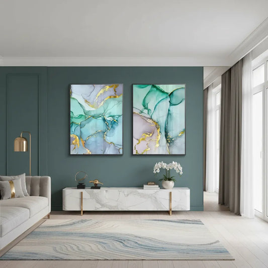 Modern living room with a set of two teal and gold abstract fine art prints in black frames above a white console table UAE Dubai.