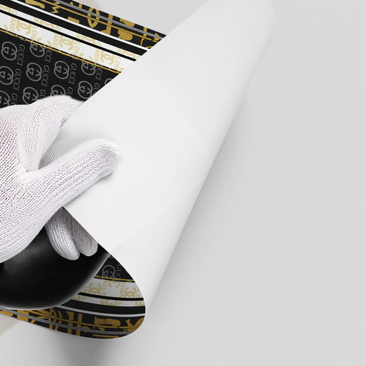 Close-up of high-quality poster print with black gold logo border