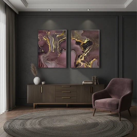 Modern living room with a set of two plum and gold abstract fine art prints in black frames above a wooden console UAE Dubai.