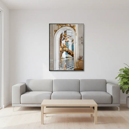 Modern minimalist living room decor with the framed giraffe fine art hung above a gray sofa.