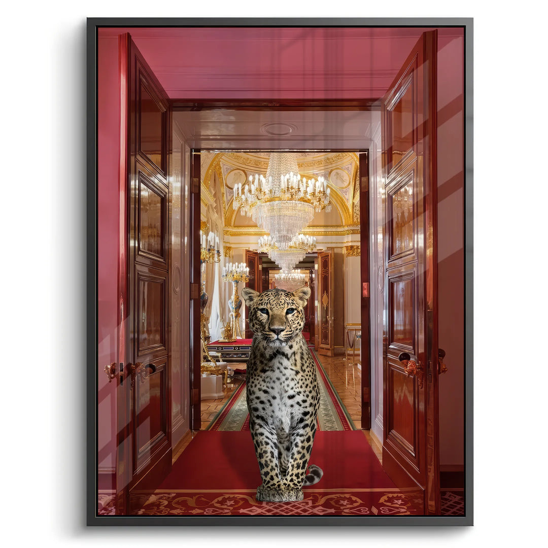 Black-framed acrylic print of a leopard standing in a grand, ornate gold and red palace hall.
