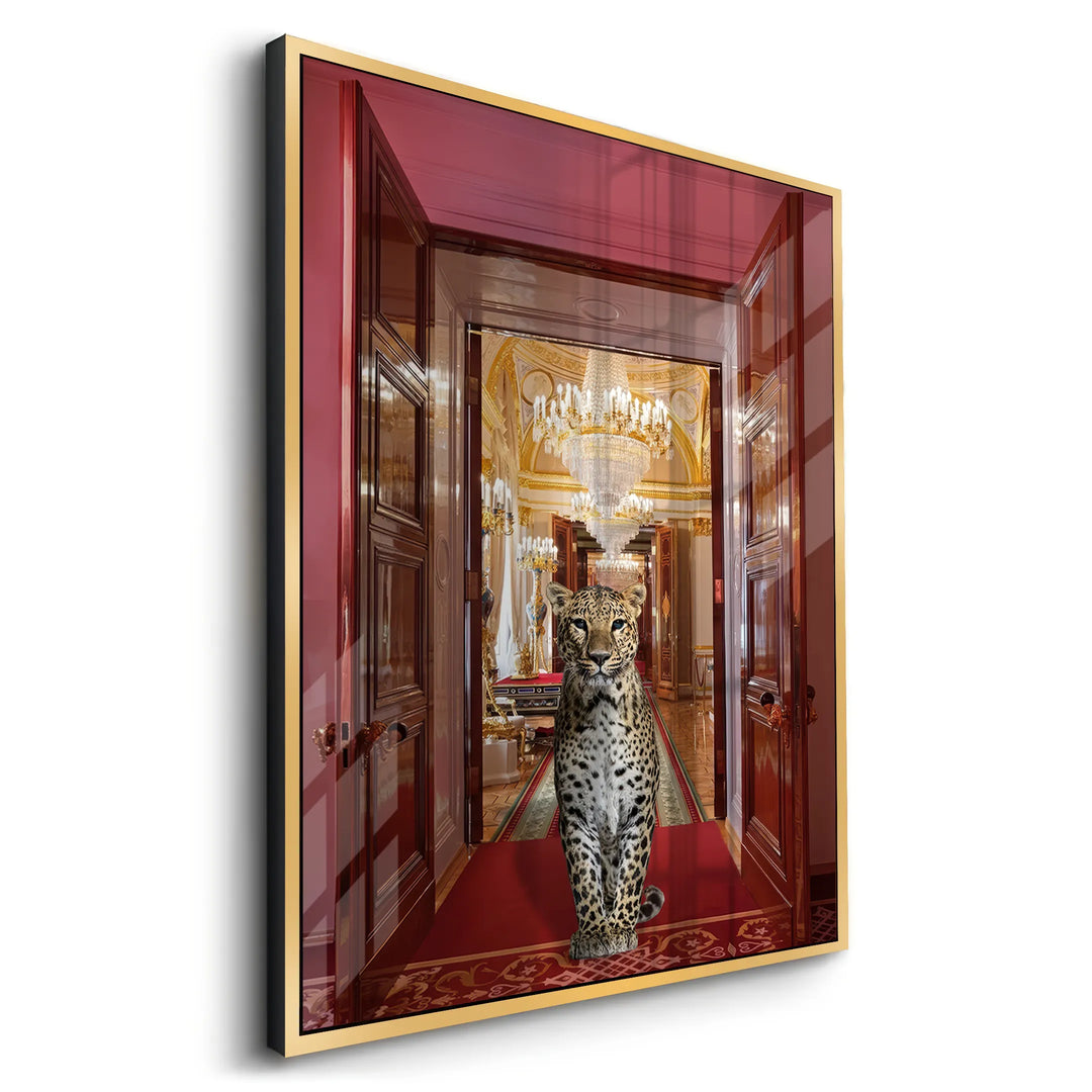 Angled view of the gold-framed acrylic art print with the leopard between grand red wooden doors.