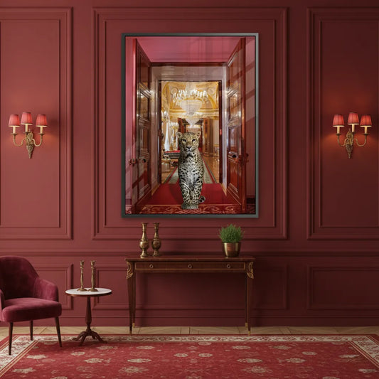 Luxury red room decor with a framed acrylic print of the leopard in the palace hanging over a console.