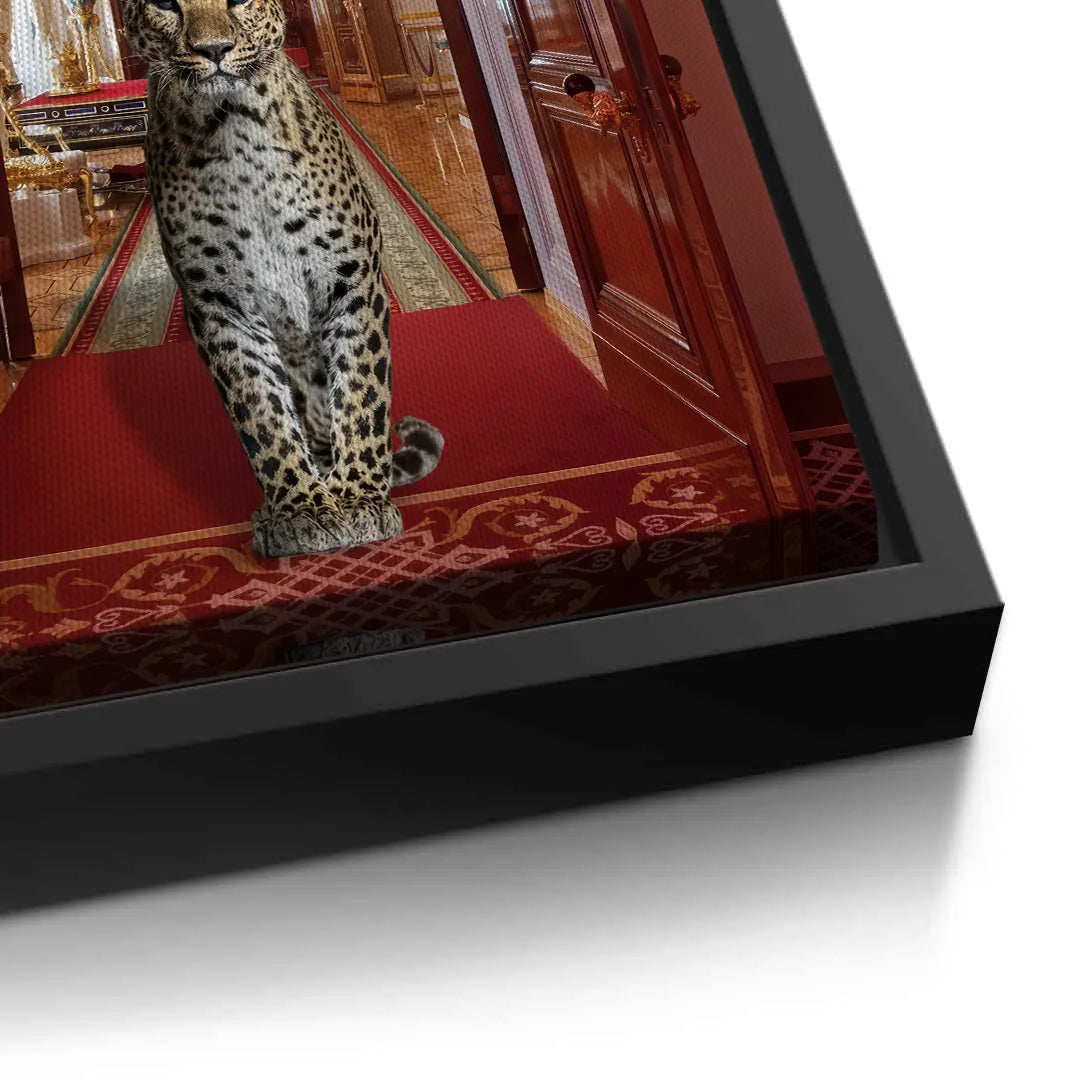 Close-up of the canvas print corner with a black frame, showing the leopard and red carpet.