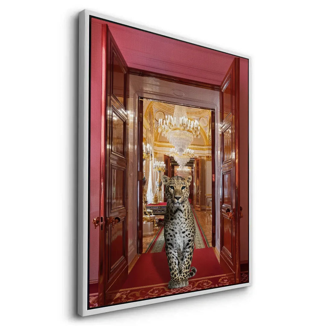 2Dynamic angled view of the white-framed canvas art of the leopard in a grand palace doorway.