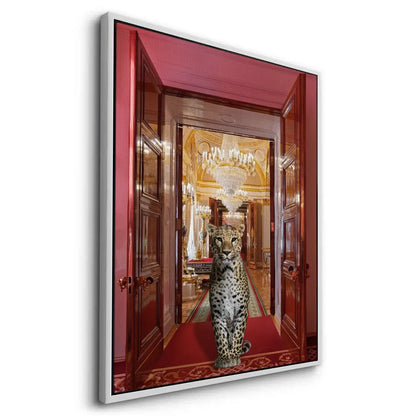 Dynamic angled view of the white-framed canvas art of the leopard in a grand palace doorway.