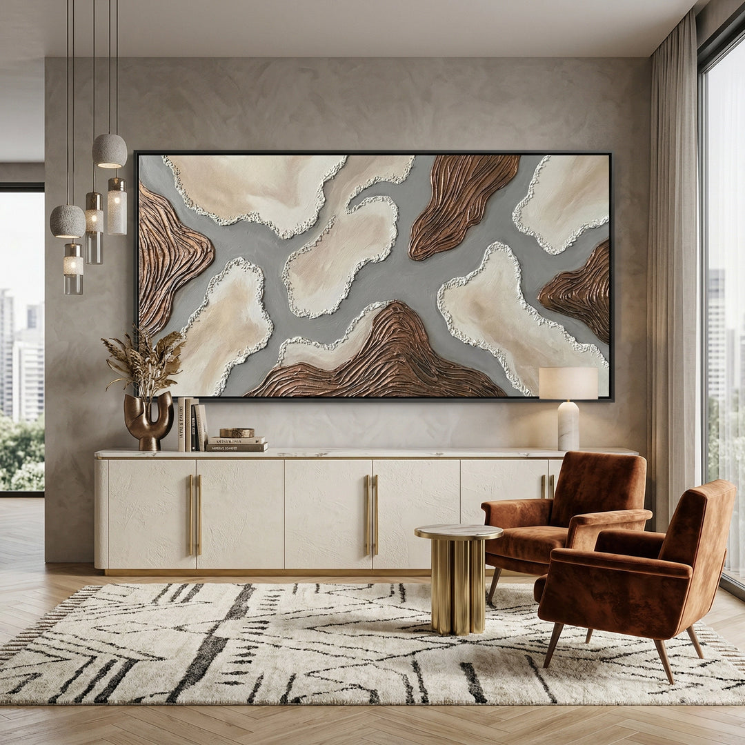 Minimalist 'Sandstone Abstract' canvas art with heavy impasto mineral grains and soft shadow play, bringing a sun-drenched 'Desert Modern' aesthetic to a modern Abu Dhabi villa.