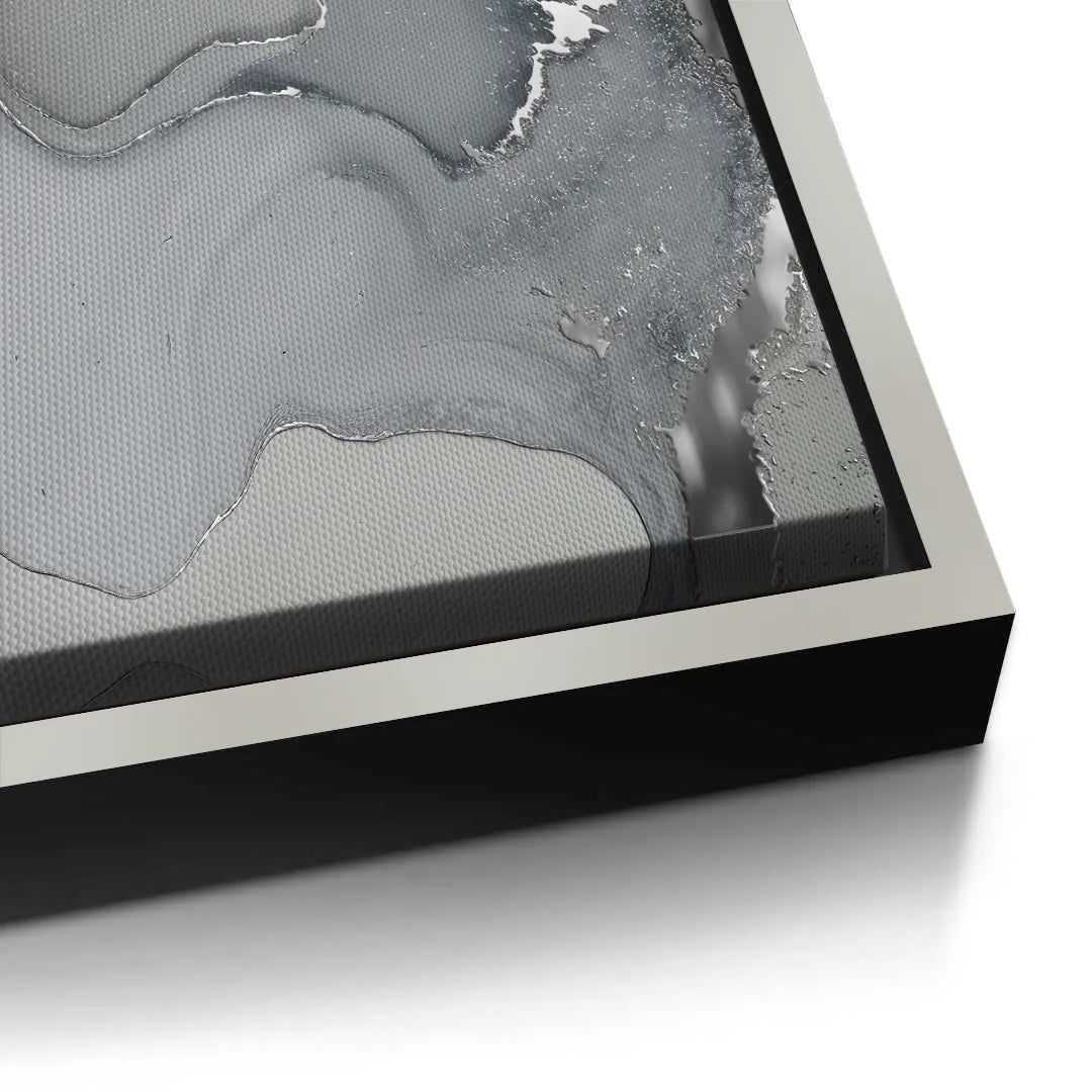 Close-up of white frame detail on grey abstract canvas edge