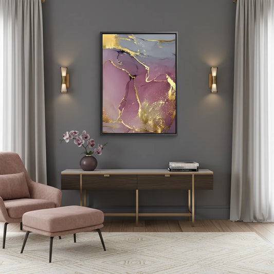 Abstract ink canvas print in black frame on wall in modern dark living room, pink, purple, gray, and gold fluid art