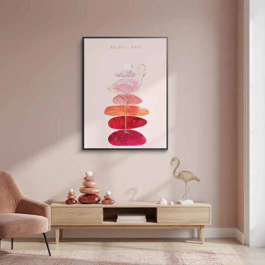 'Balance, Baby' fine art print, framed in black, hanging on a wall above a wooden console table in a living room.