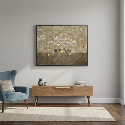 Framed Canvas wall art of deer and love quote above a wooden credenza in a light, neutral room