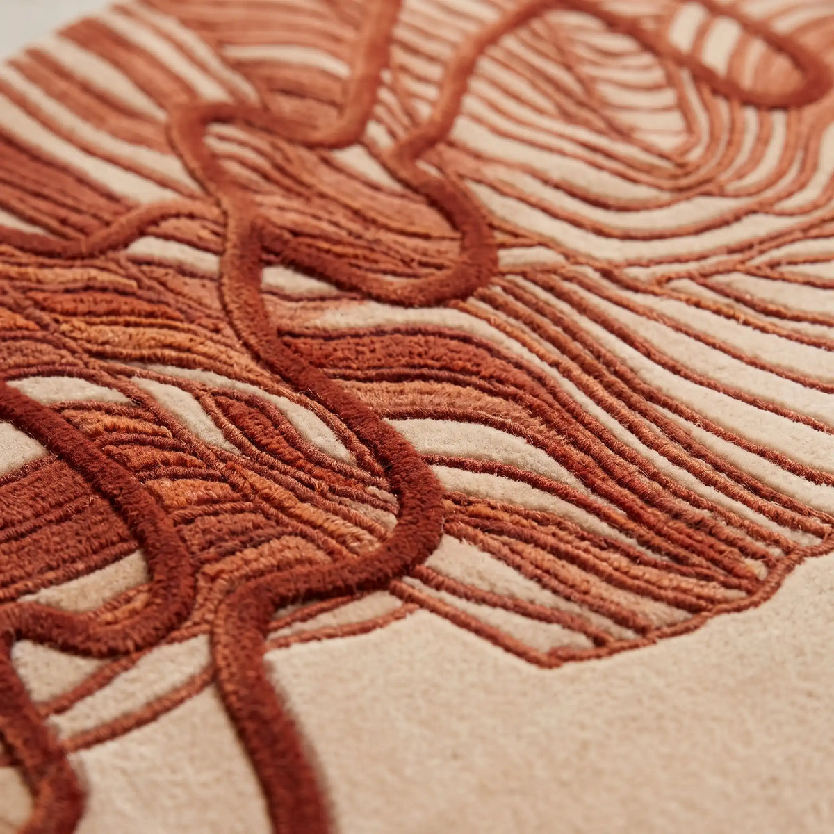 Contour Leaf hand-tufted rug in Terracotta – close-up of the tufted pile texture