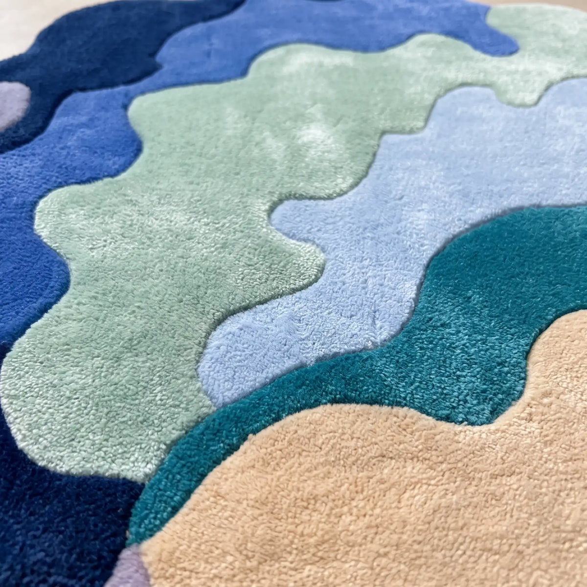 Wave Bloom hand-tufted rug in Ocean Blue – close-up of the tufted pile texture