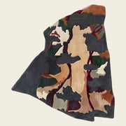 Forest Mosaic hand-tufted rug in Charcoal Autumn – flat lay