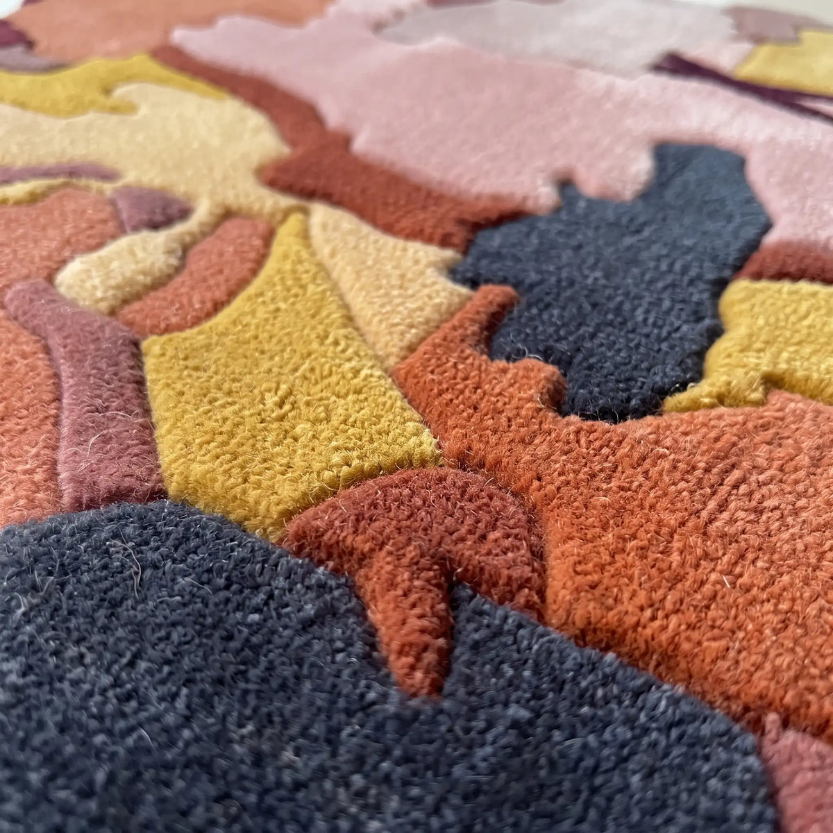Forest Mosaic hand-tufted rug in Sunset Mauve – close-up of the tufted pile texture