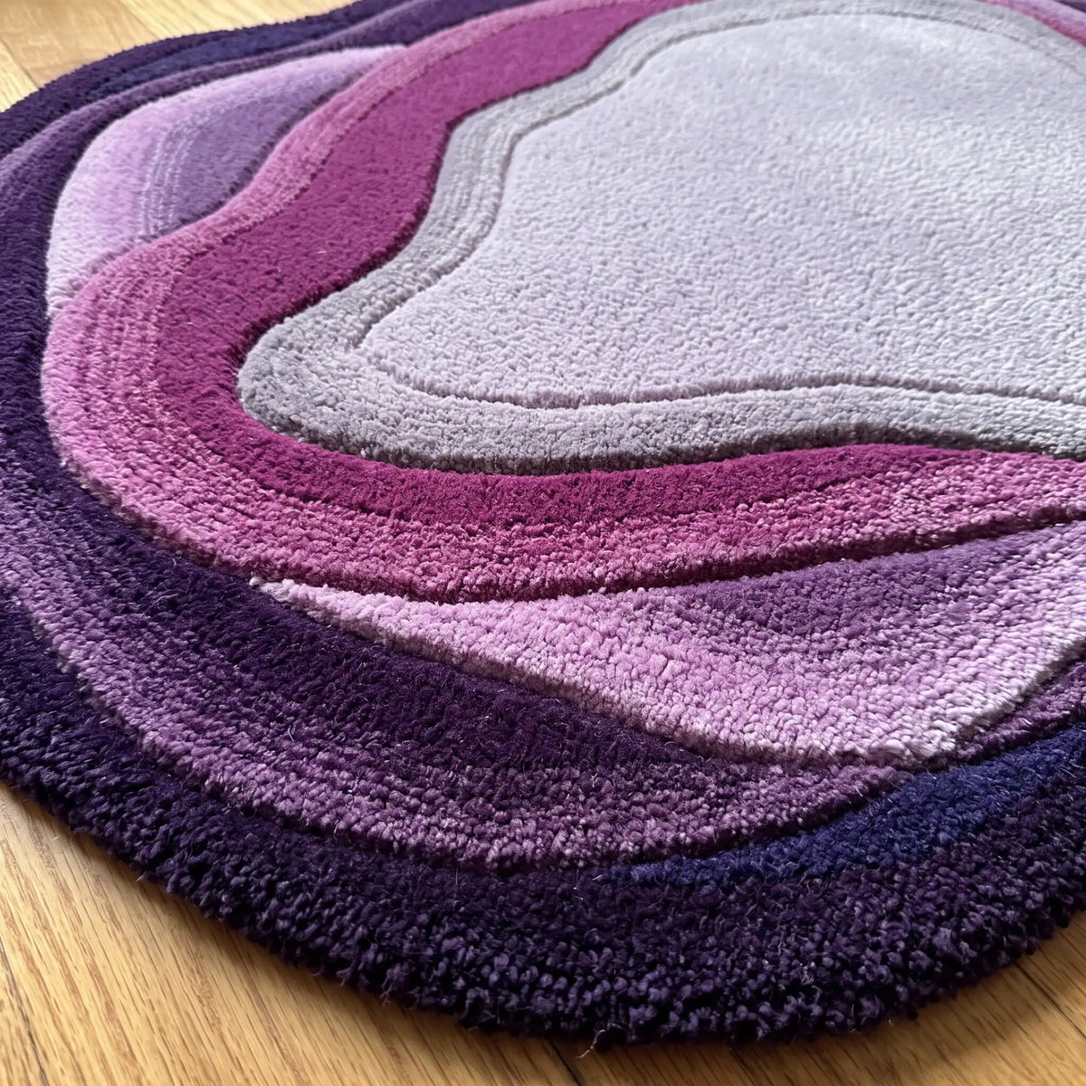 Stone Pool hand-tufted rug in Plum Orchid – close-up of the tufted pile texture