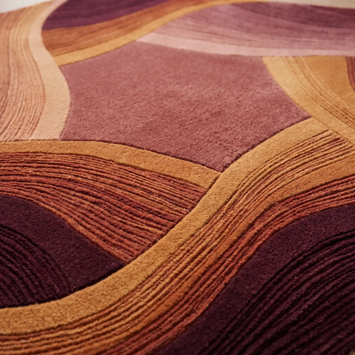 Ember Facets hand-tufted rug in Rose Flame – close-up of the tufted pile texture