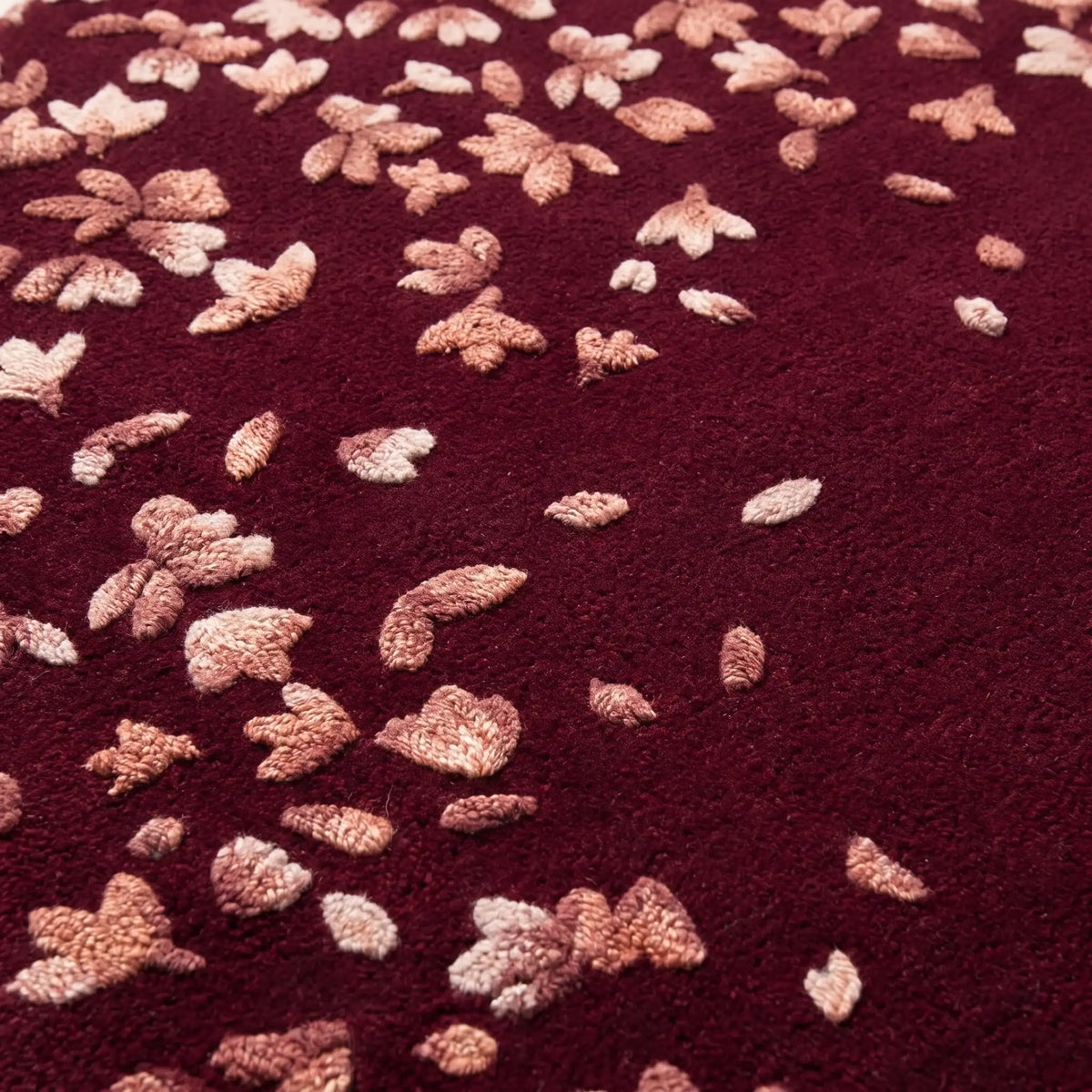 Stardust hand-tufted rug in Ruby Wine – close-up of the tufted pile texture