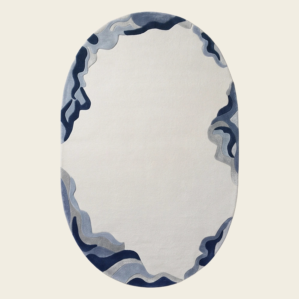 Cloud Edge hand-tufted rug in Indigo Ivory – flat lay