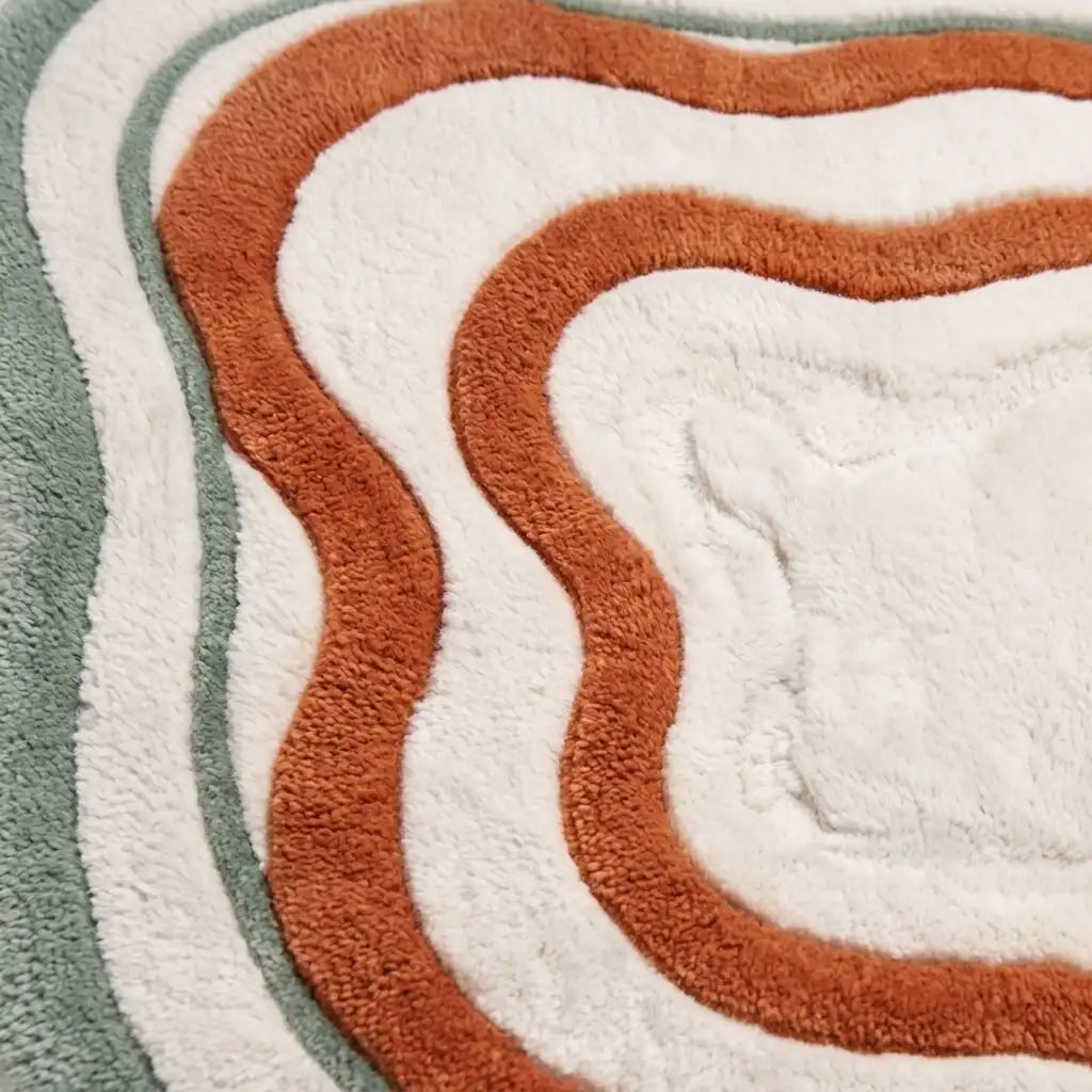 Lagoon Lines hand-tufted rug in Coral Line – close-up of the tufted pile texture