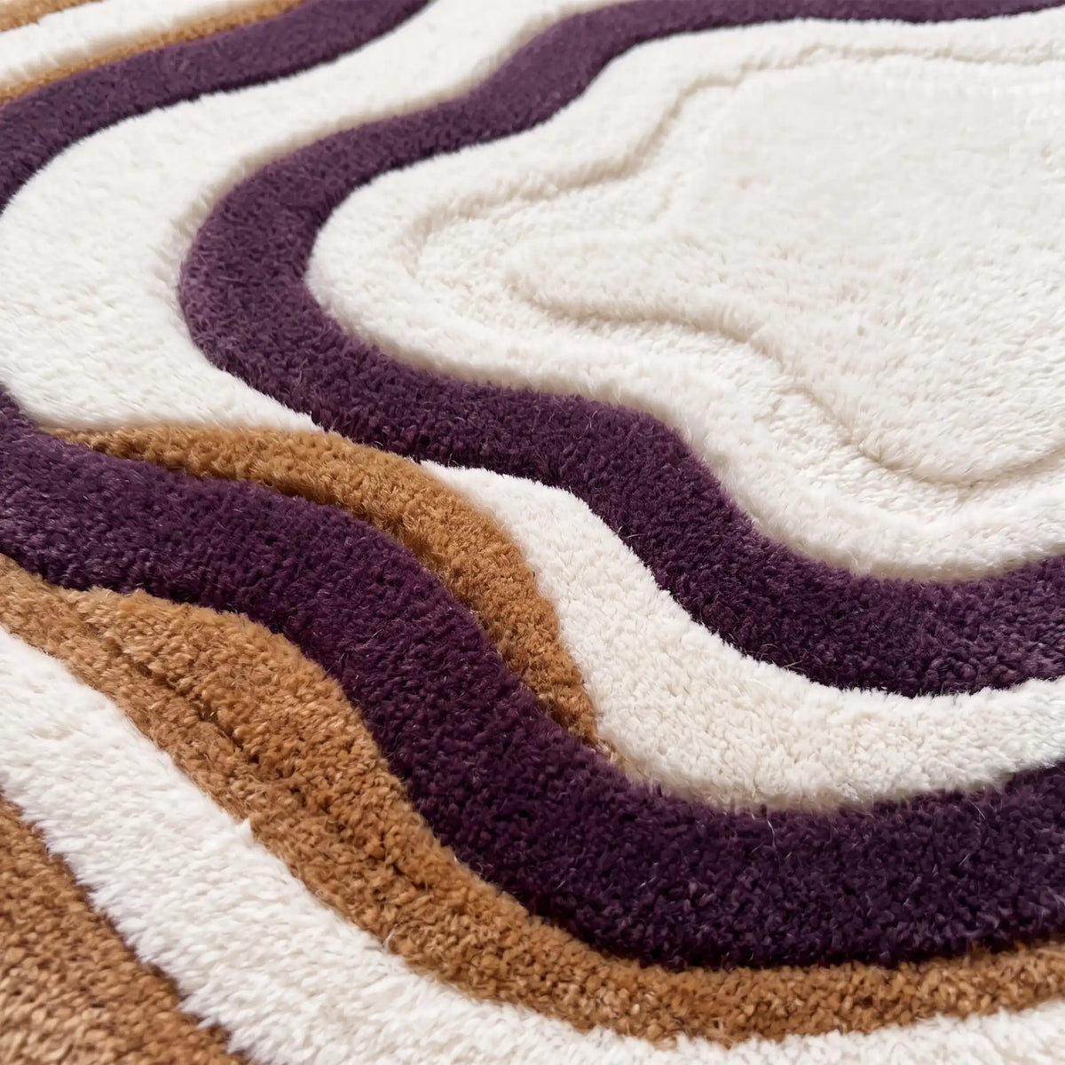 Lagoon Lines hand-tufted rug in Plum Line – close-up of the tufted pile texture