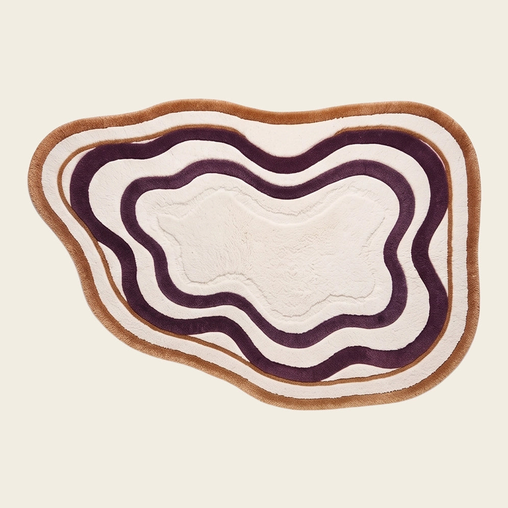 Lagoon Lines hand-tufted rug in Plum Line – flat lay