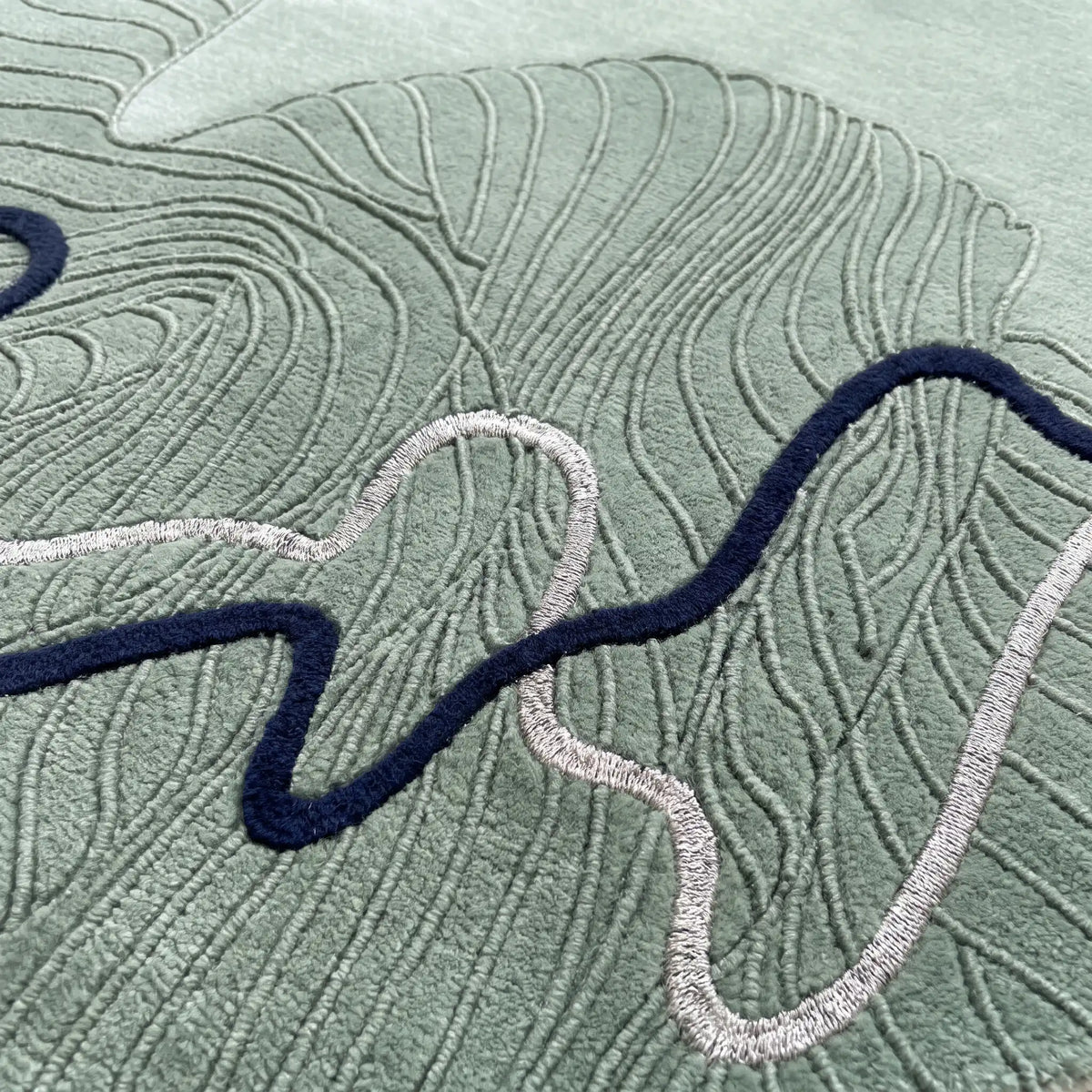 River Pebble hand-tufted rug in Seafoam – close-up of the tufted pile texture